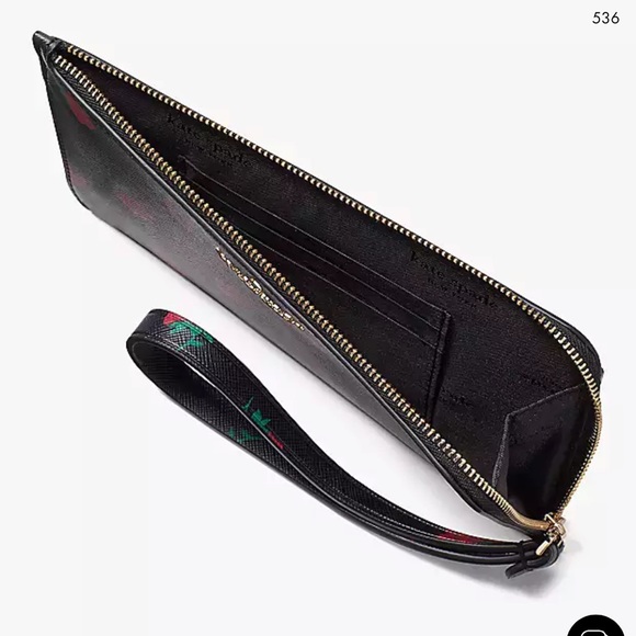 Kate Spade Lucy Medium L-Zip Wristlet
COLOR:
Black Multi
NWT - Picture 2 of 16
